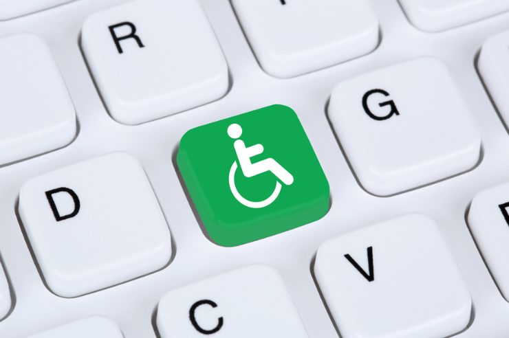 Symbol of person in a wheelchair on a keyboard key