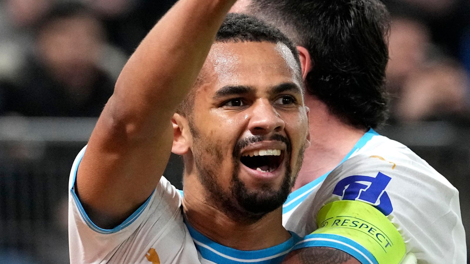 Marseille's Iliman Ndiaye celebrates after scoring his side sencond goal during the Europa League League play-off first leg soccer match between Shakhtar Donetsk and Olympique Marseille at Volksparkstadion in Hamburg, Germany, Thursday, Feb. 15, 2024. (AP Photo/Martin Meissner)