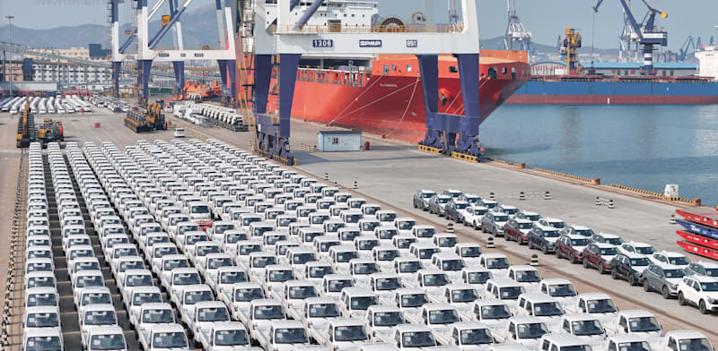 Vehilces awaiting export at Port of Yantai, China  credit: Reuters/Costfoto