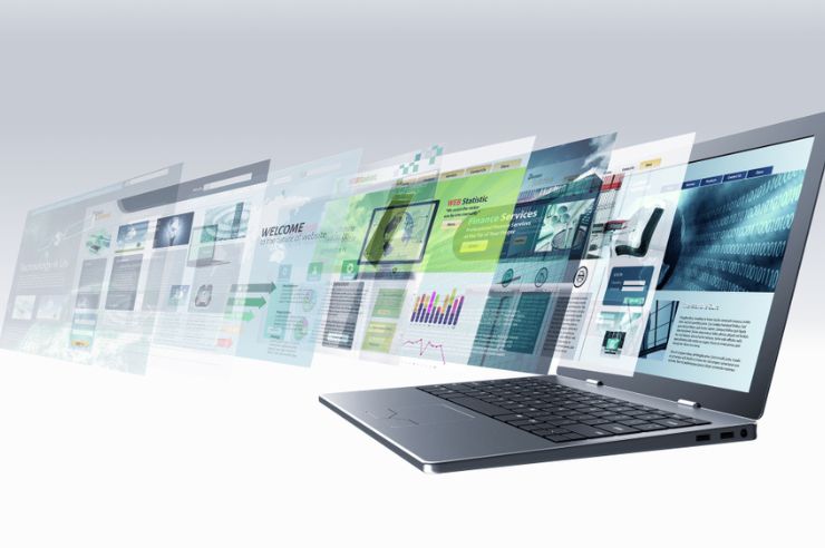 A laptop computer with multiple pages popping out of screen