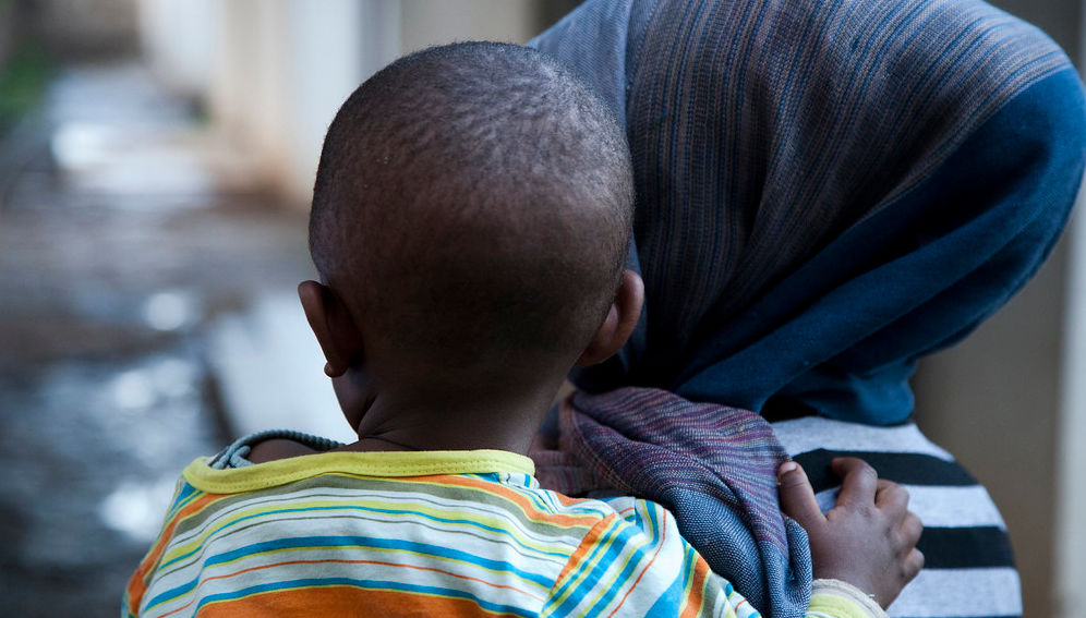 A mother with her 18-month-old son at the Saris Health Center in Addis Ababa. Photo: UNICEF Ethiopia/2012/Getachew [Africa has the biggest burden of HIV, yet is often sidelined in the global response].