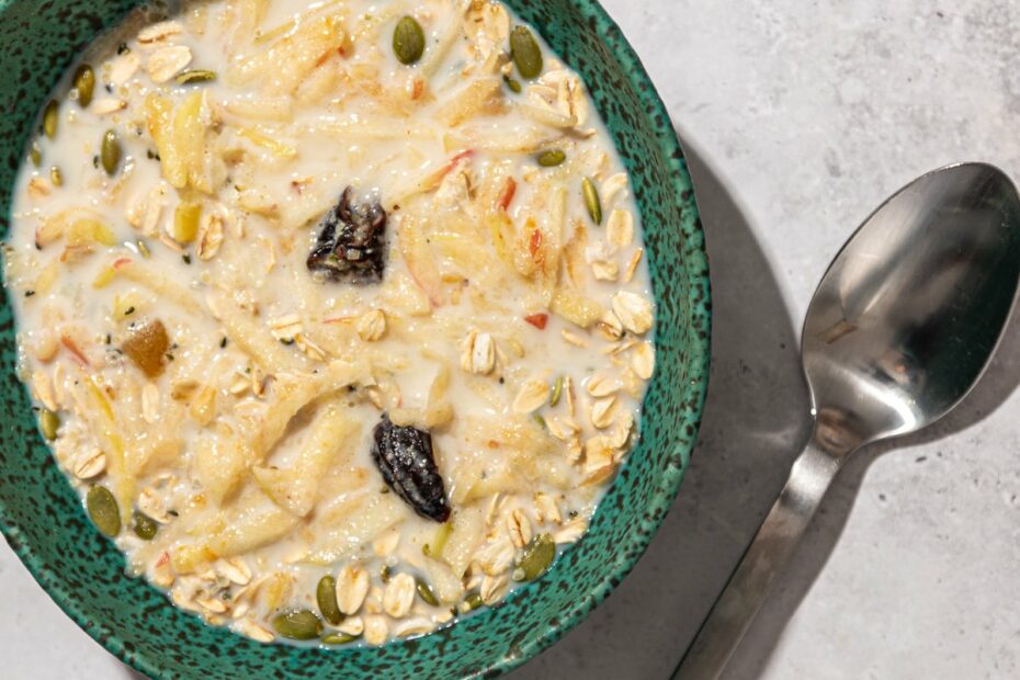 muesli in blue bowl with spoon
