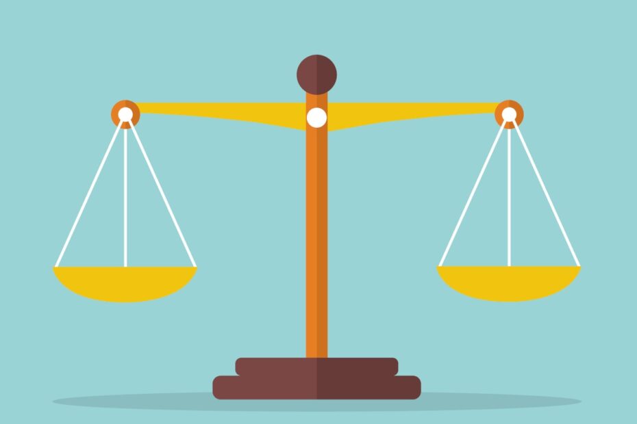 A cartoon image of a gold justice scale against a blue background to symbolise balance and legal tech regulations.