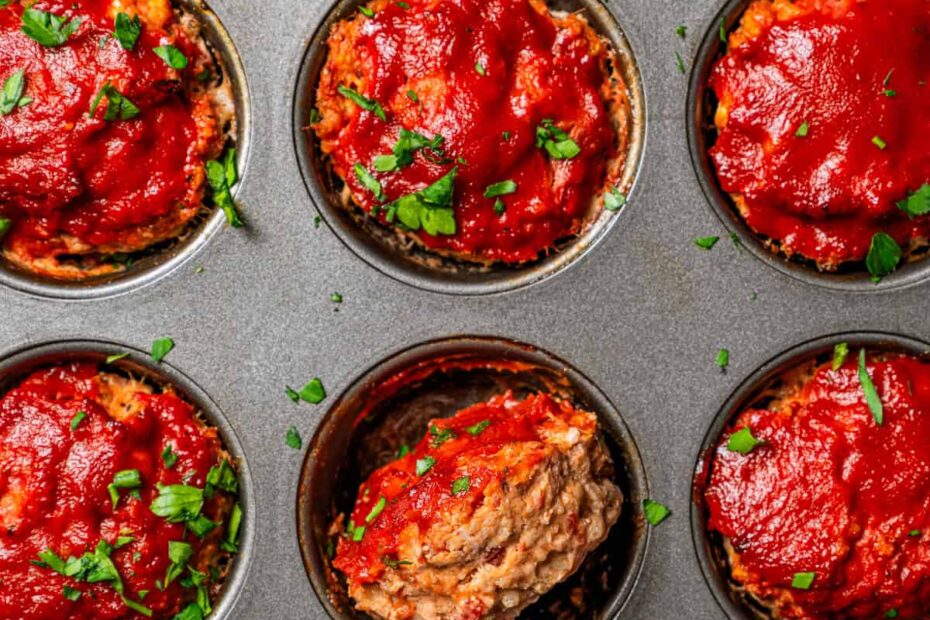 Baked mini meatloaf in a muffin pan.