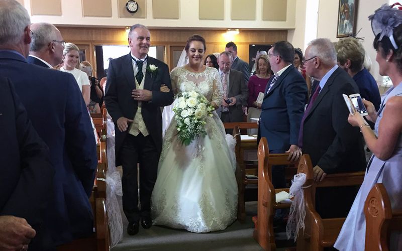 The beautiful Eimear walking up the aisle with her father.