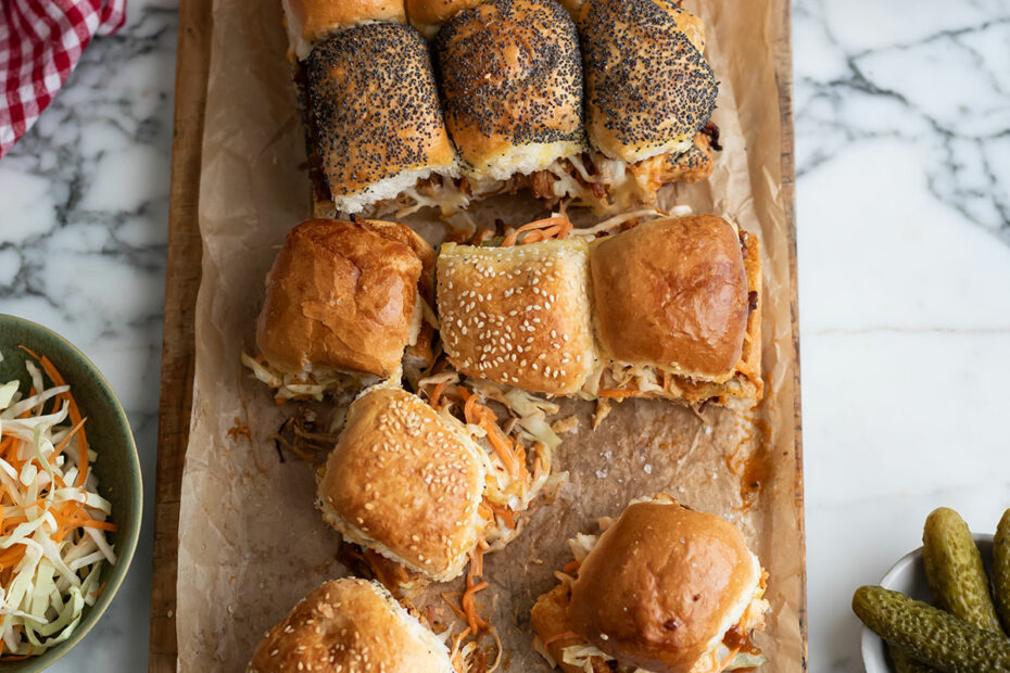 Instant Pot Ginger Beer Pulled Pork Sliders on a board