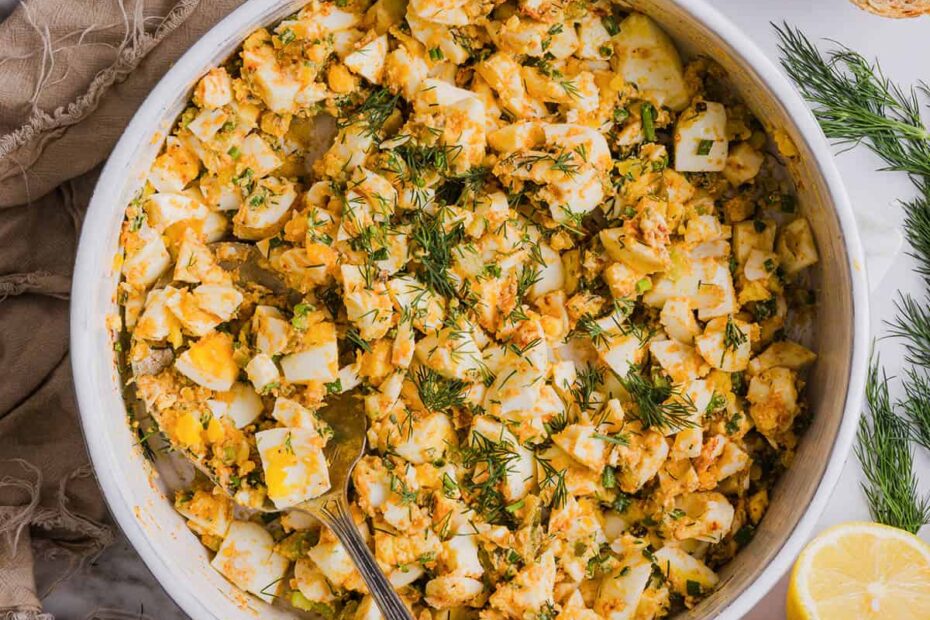 This Healthy Egg Salad is packed with protein, fresh flavors and made healthier with Greek yogurt in place of mayo!  Enjoy this on a sandwich, lettuce wrap, with crackers or straight from the bowl!