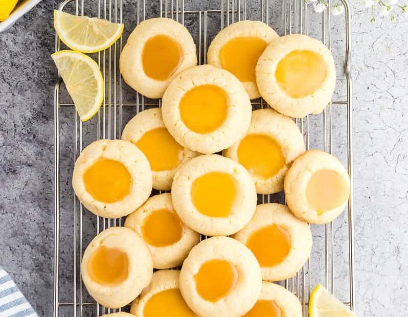lemon thumbprint cookies on a cooling rack