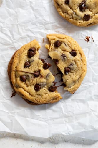 a single serve cookie split in half on parchment paper