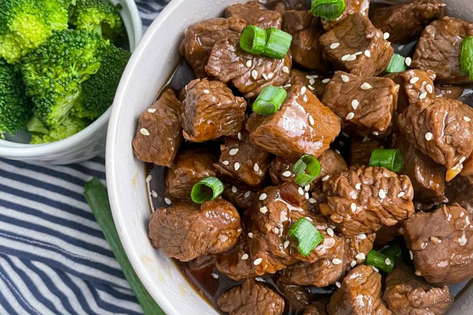 teriyaki steak bites in a white serving bowl