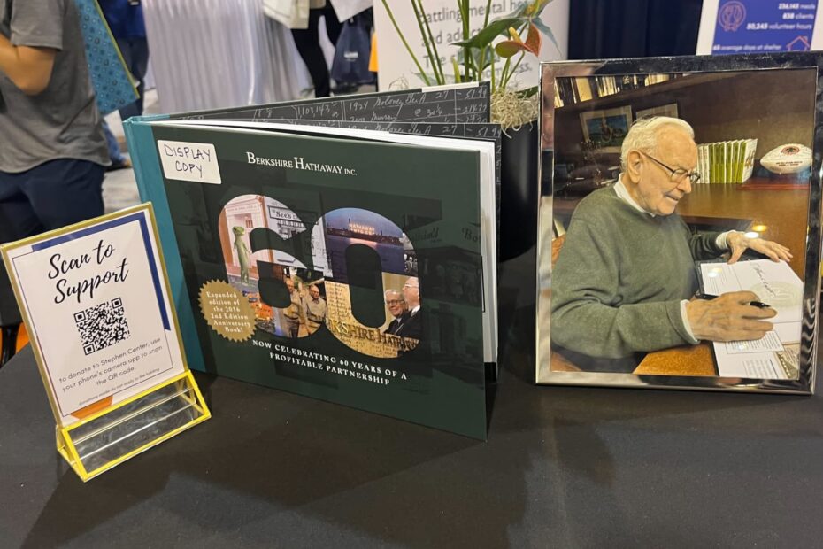 Autographed Warren Buffett books fetch as much as $100,000 at Berkshire meeting auction