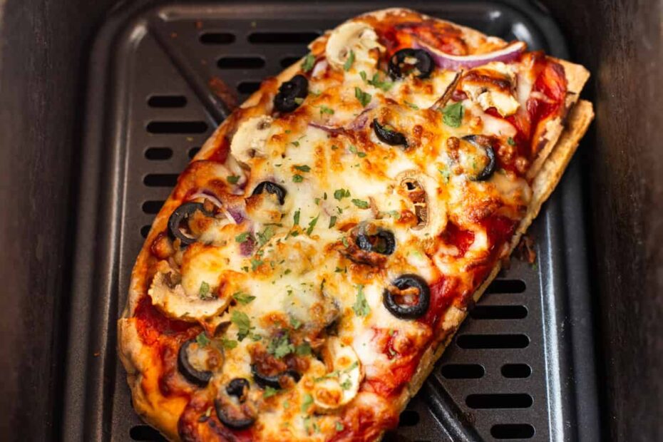 Vegetarian pitta bread pizza in an air fryer.