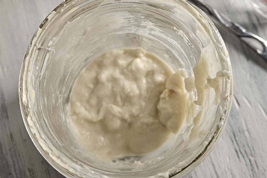 Sourdough starter in a glass jar.