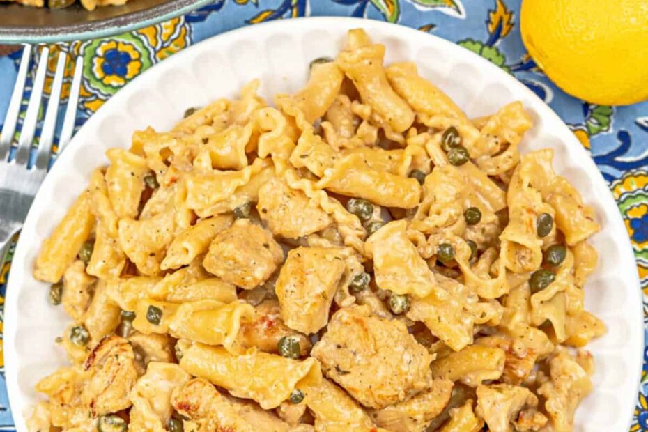 plate of of chicken piccata pasta with text overlay