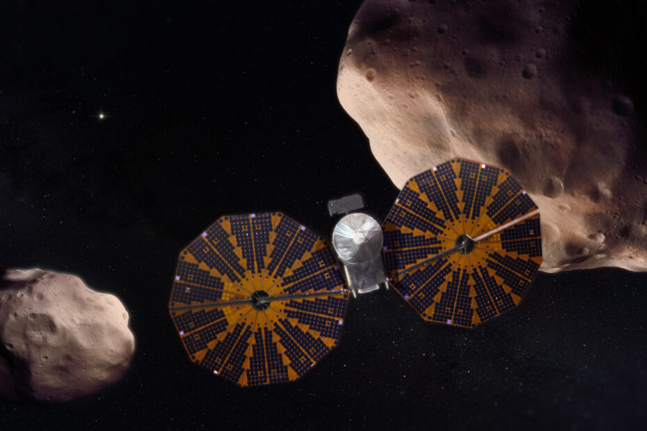 a rectangular spacecraft with two large round wing-like solar panels flies between two crater-marked rocks in space