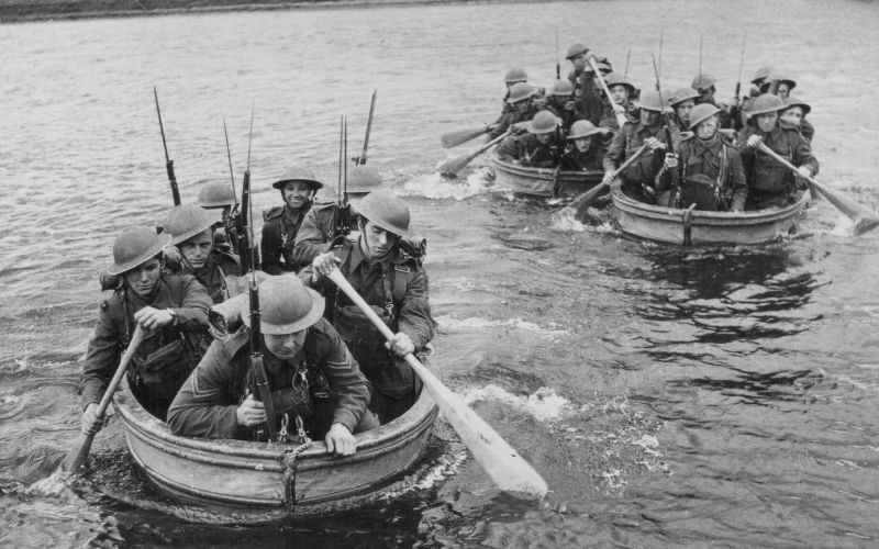Irish troops undertaking military maneuvers in assault boats during World War Two, Northern Ireland, circa 1939-1945.