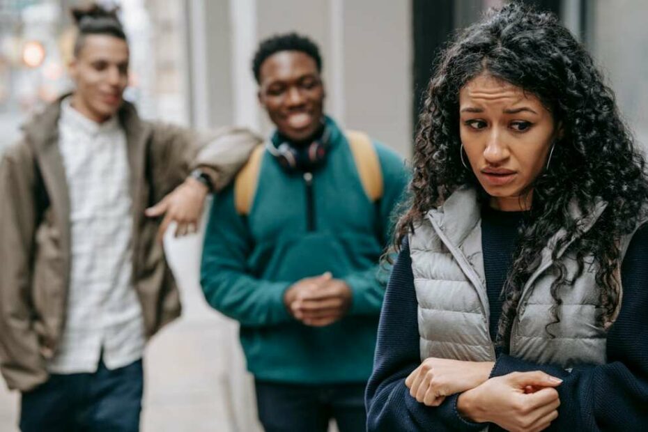 Men giving backhanded compliments to a woman