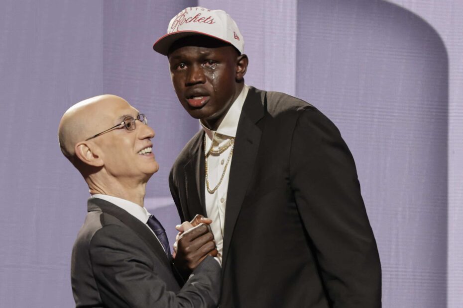 Khaman Maluach reacts as he greets NBA commissioner Adam Silver after being selected 10th by the Houston Rockets in the first round of the NBA basketball draft, Wednesday, June 25, 2025, in New York.