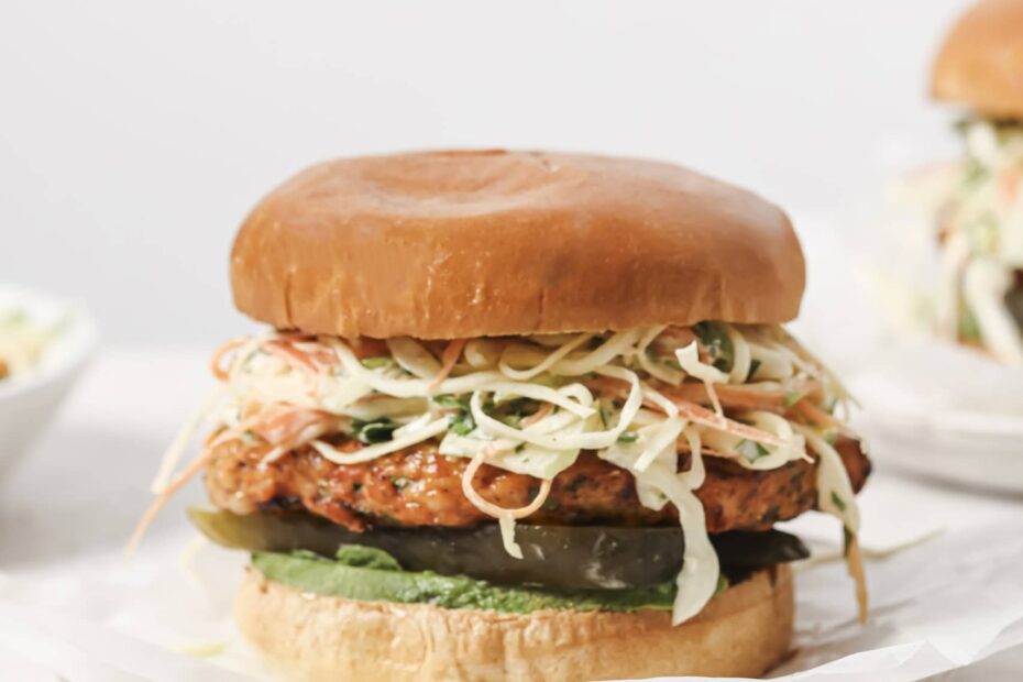 air fryer chicken burger with slaw on a white plate