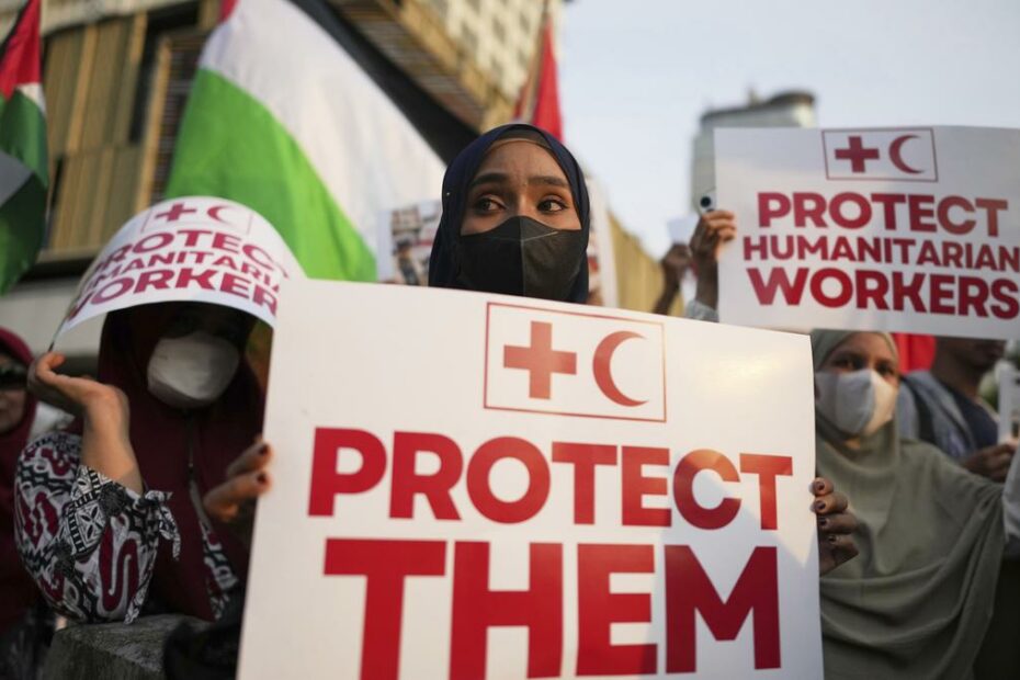 Hamas says it killed 12 ‘Israeli-backed fighters’; Israeli-supported group says they were aid workers