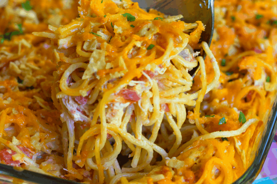 A delicious, easy to make casserole with spaghetti, chicken, Rotel tomatoes and chilie, cream cheese, sour cream and cheddar cheese. A great dish for potlucks, covered dish suppers or when you