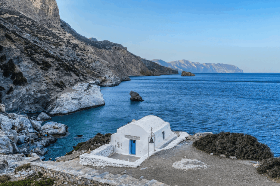 beach with its small white chapel at Milos