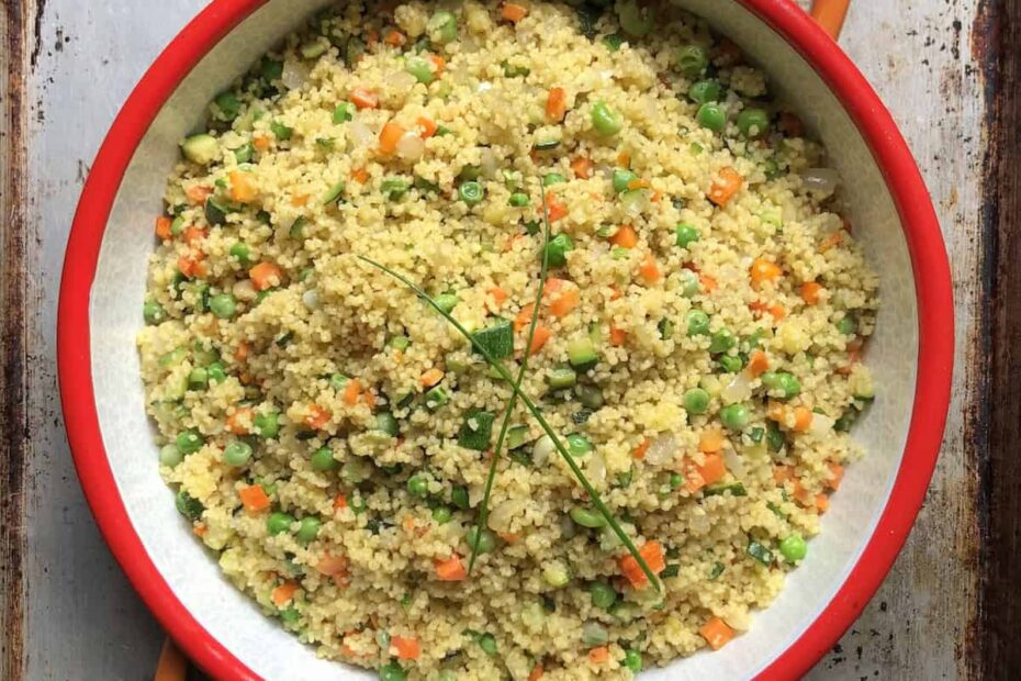 A serving dish filled with couscous salad made the authentic Mediterranean way.