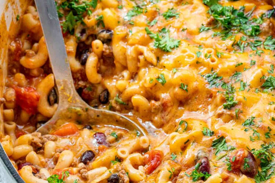 freshly made chili mac and cheese in a Dutch oven.