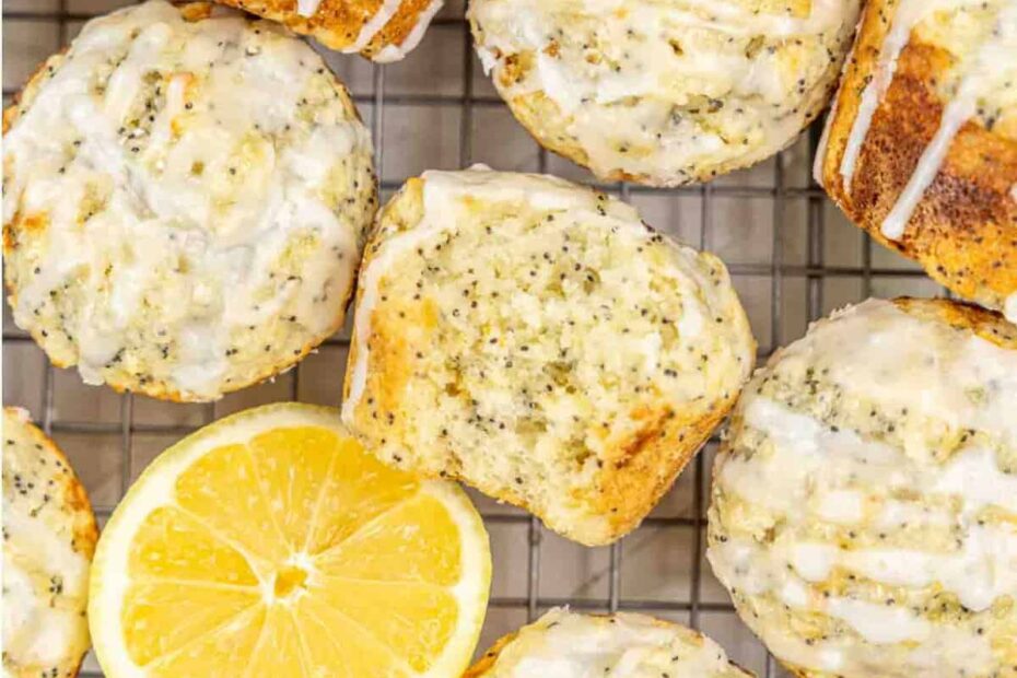 lemon poppy seed muffins on a cooling rack with text ovleray