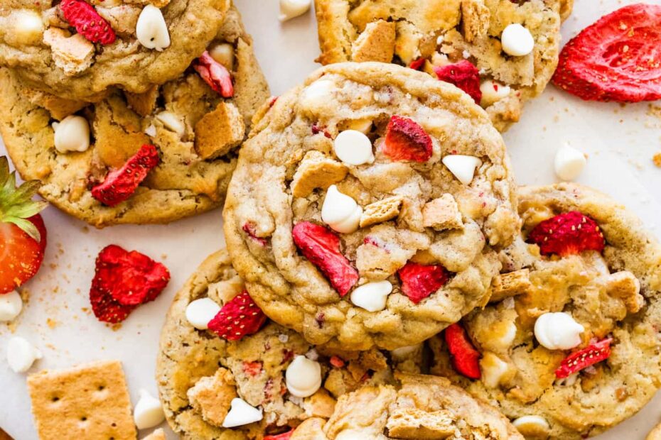 strawberry cheesecake cookies with freeze dried strawberries, graham crackers, and white chocolate chips.