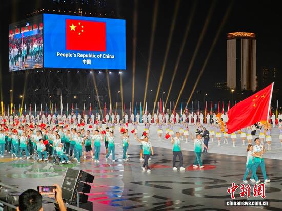 Members of the delegation of China parade during the opening ceremony of the World Games 2025 in Chengdu, southwest China's Sichuan Province, on Aug. 7, 2025. (Photo: China News Service/Zhang Lang)