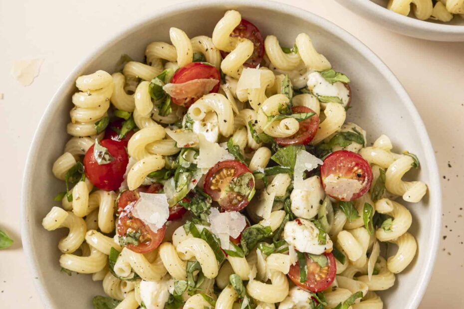 caprese pasta salad in a big white bowl