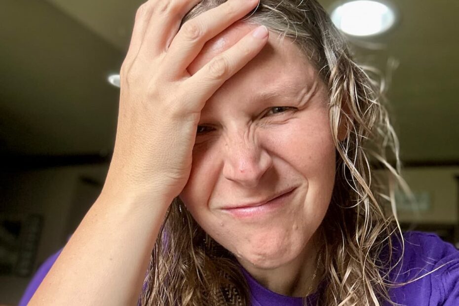 woman facepalm head in frustration