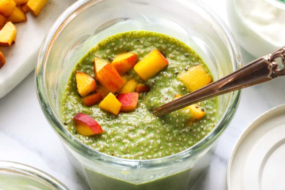 matcha chia pudding topped with peaches.
