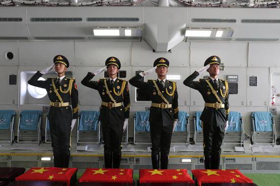 A ceremony is held for handing over the remains and related items of the 12th batch of Chinese People's Volunteers (CPV) martyrs who lost their lives during the War to Resist US Aggression and Aid Korea, at Incheon International Airport in South Korea, Sept. 12, 2025. (Photo: China News Service/Xiao Hang)