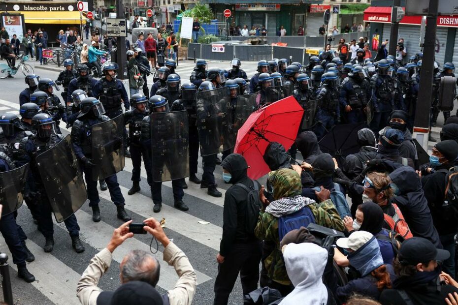 French protesters clash with police; roads blocked, fires set, 200 arrested