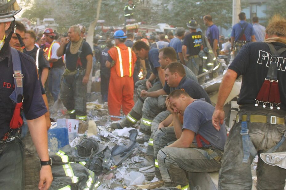 Exhausted 9/11 first responders at Ground Zero on Sept 11 2001, at the World Trade Center.