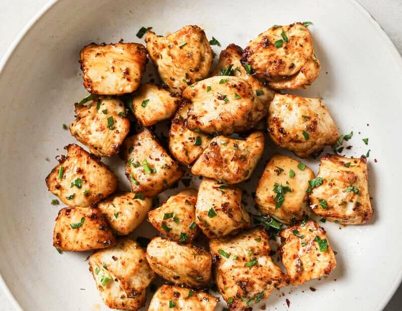 cooked air fryer chicken bites on a plate