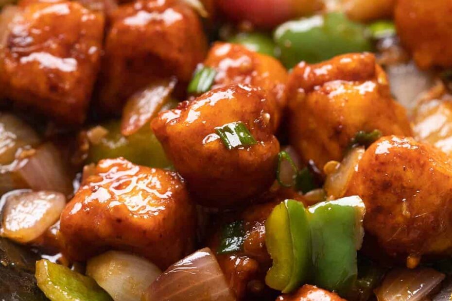 Close up of street style chilli paneer in a wok