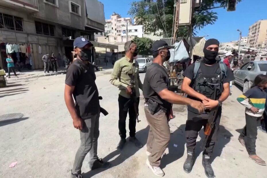 Masked Hamas fighters seen executing men in Gaza City as the group fights with rival powers - Egypt Independent