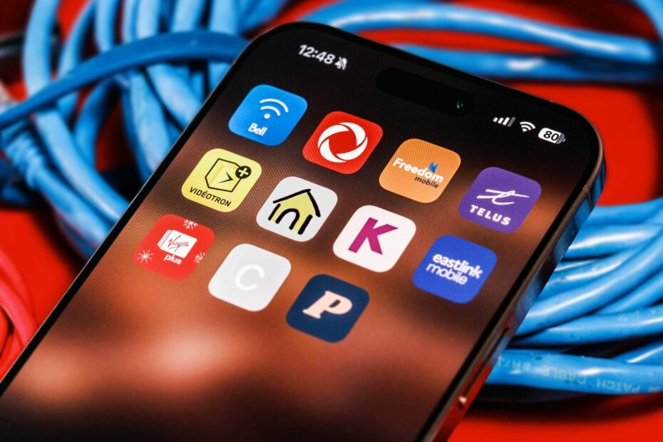 Canadian telecom company logos on an iPhone.