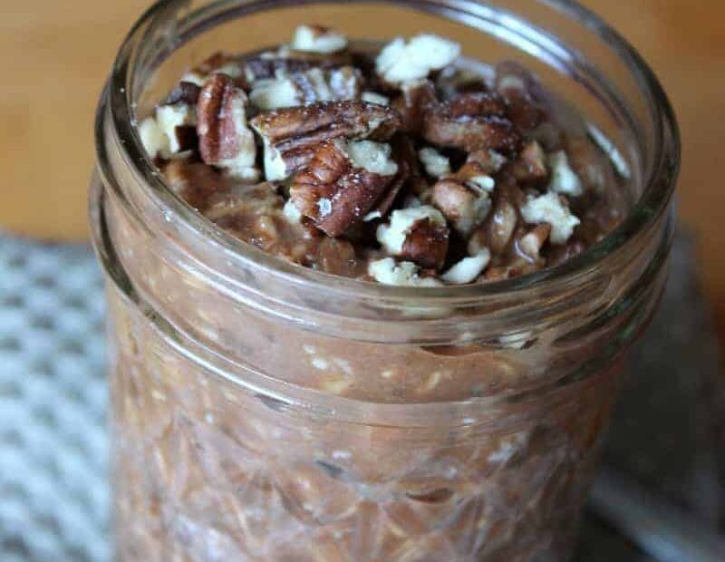 a jar of chocolate overnight oats with dates.