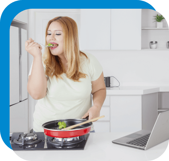 A woman prepping a healthy meal in her kitchen