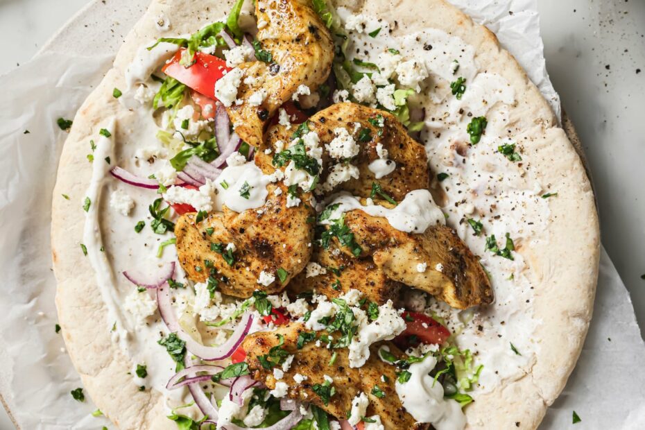 Delicious grilled chicken tacos with fresh vegetables, crumbled cheese, and creamy sauce. Perfect for quick, flavorful meals.