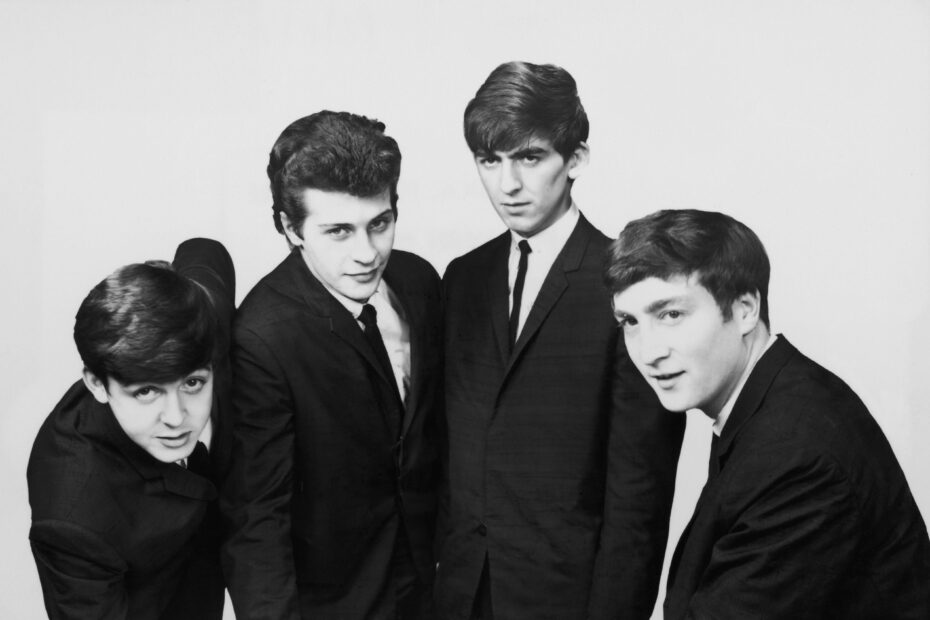 The Beatles: Paul McCartney, Pete Best, George Harrison and John Lennon.