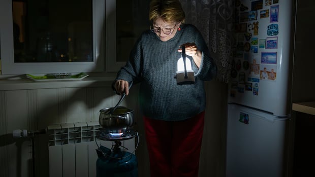 Kyiv residents stranded in tower blocks as Russia targets power system | CBC News