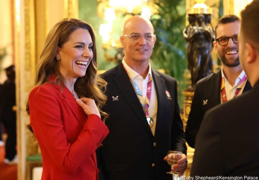 The Princess in Vibrant Red Trouser Suit for Windsor Castle Rugby Reception